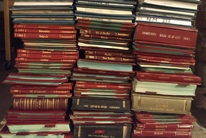 Record books stacked on top of one another